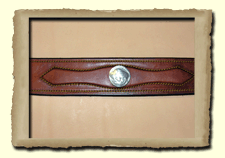 Molded relief belt with concho